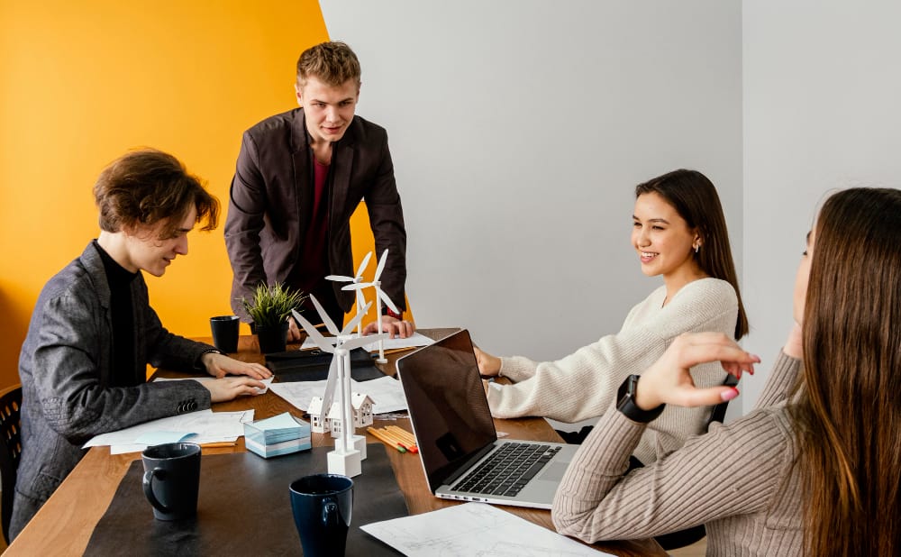 Post-merger integration meeting uniting two staffing branch cultures